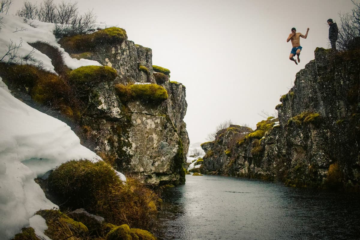 Jon making the leap - cliff jump in Iceland